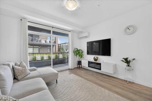 4101-200 Seton Circle Se, Calgary, AB - Indoor Photo Showing Living Room