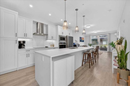 4101-200 Seton Circle Se, Calgary, AB - Indoor Photo Showing Kitchen With Upgraded Kitchen