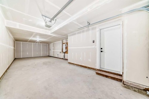103 Osprey Hill Point Sw, Calgary, AB - Indoor Photo Showing Other Room