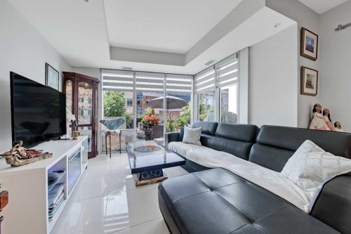 307-1020 9 Avenue Se, Calgary, AB - Indoor Photo Showing Living Room