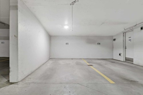 307-1020 9 Avenue Se, Calgary, AB - Indoor Photo Showing Garage