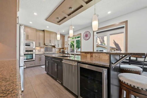 160 Panatella Crescent Nw, Calgary, AB - Indoor Photo Showing Kitchen With Upgraded Kitchen