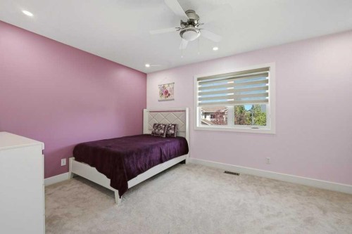 160 Panatella Crescent Nw, Calgary, AB - Indoor Photo Showing Bedroom