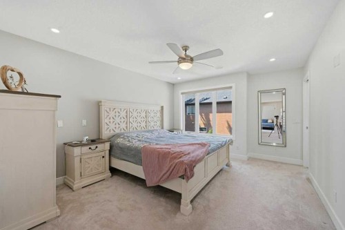 160 Panatella Crescent Nw, Calgary, AB - Indoor Photo Showing Bedroom
