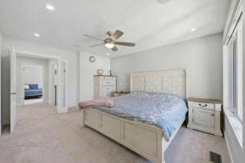160 Panatella Crescent Nw, Calgary, AB - Indoor Photo Showing Bedroom