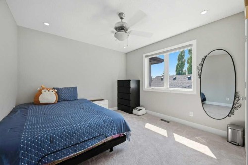 160 Panatella Crescent Nw, Calgary, AB - Indoor Photo Showing Bedroom