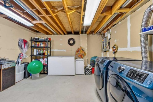 83 Millrise Crescent Sw, Calgary, AB - Indoor Photo Showing Laundry Room
