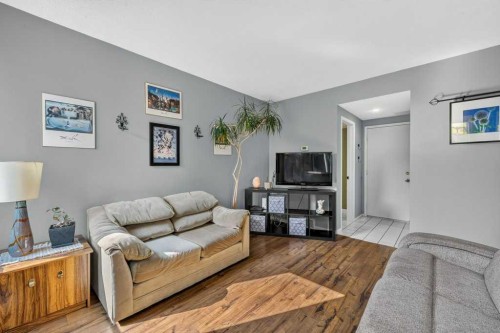83 Millrise Crescent Sw, Calgary, AB - Indoor Photo Showing Living Room