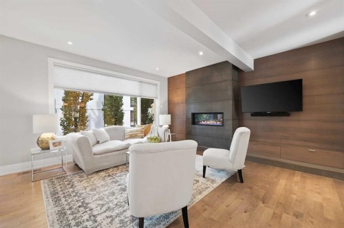 826 Durham Avenue Sw, Calgary, AB - Indoor Photo Showing Living Room With Fireplace