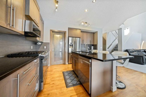 109 Seagreen Link, Chestermere, AB - Indoor Photo Showing Kitchen With Upgraded Kitchen