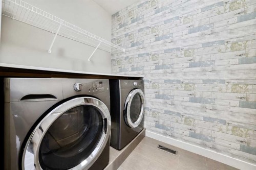 109 Seagreen Link, Chestermere, AB - Indoor Photo Showing Laundry Room