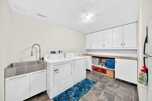 6203 Dalmarnock Green Nw, Calgary, AB - Indoor Photo Showing Laundry Room