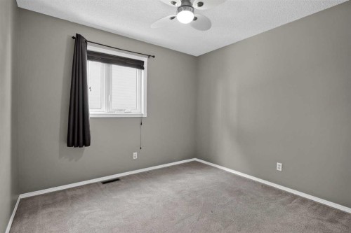 940 Coventry Drive Ne, Calgary, AB - Indoor Photo Showing Other Room