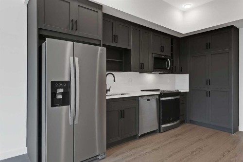 623-3932 University Avenue Nw, Calgary, AB - Indoor Photo Showing Kitchen With Stainless Steel Kitchen