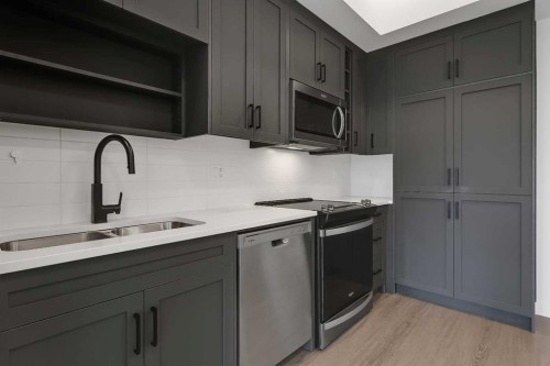 623-3932 University Avenue Nw, Calgary, AB - Indoor Photo Showing Kitchen With Double Sink With Upgraded Kitchen