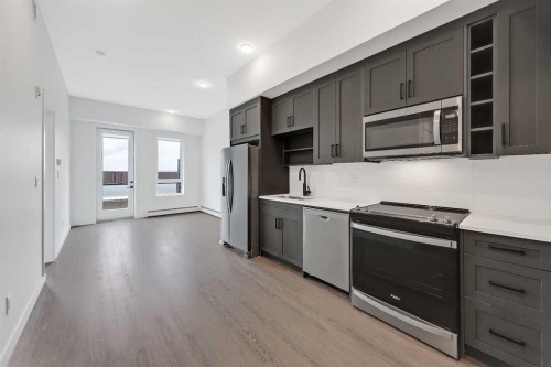 623-3932 University Avenue Nw, Calgary, AB - Indoor Photo Showing Kitchen With Stainless Steel Kitchen With Upgraded Kitchen
