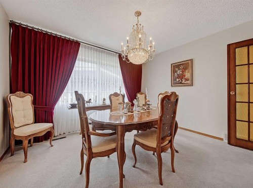 9556 Oakland Way Sw, Calgary, AB - Indoor Photo Showing Dining Room