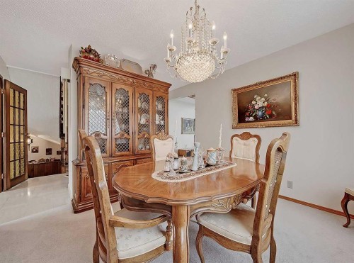 9556 Oakland Way Sw, Calgary, AB - Indoor Photo Showing Dining Room
