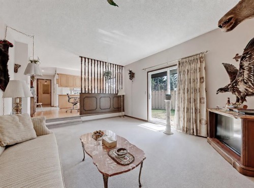 9556 Oakland Way Sw, Calgary, AB - Indoor Photo Showing Other Room