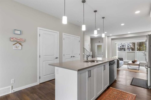111 Hillcrest Close Sw, Airdrie, AB - Indoor Photo Showing Kitchen With Upgraded Kitchen
