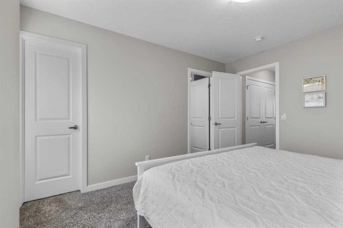111 Hillcrest Close Sw, Airdrie, AB - Indoor Photo Showing Bedroom