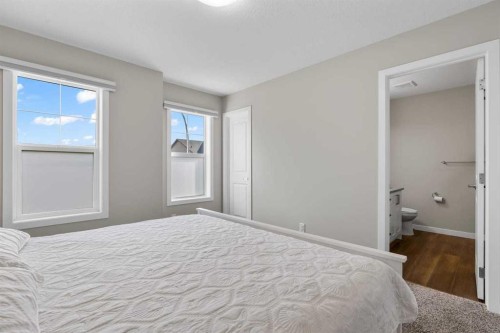 111 Hillcrest Close Sw, Airdrie, AB - Indoor Photo Showing Bedroom