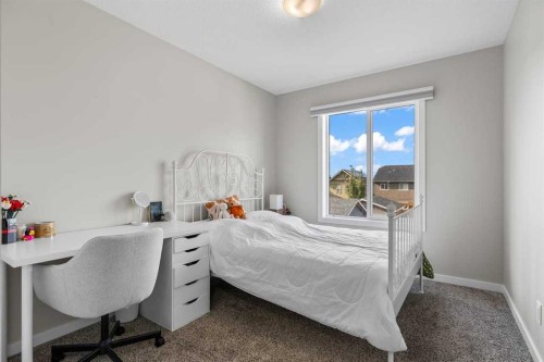 111 Hillcrest Close Sw, Airdrie, AB - Indoor Photo Showing Bedroom
