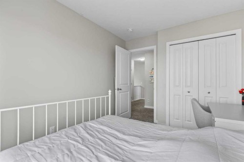111 Hillcrest Close Sw, Airdrie, AB - Indoor Photo Showing Bedroom