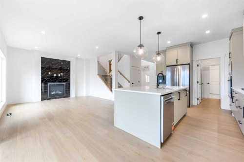 503 Rivercrest View, Cochrane, AB - Indoor Photo Showing Kitchen With Upgraded Kitchen
