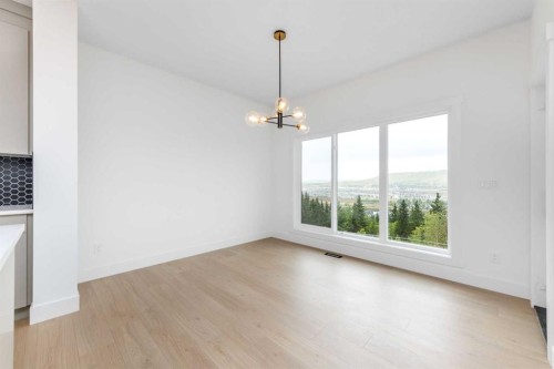 503 Rivercrest View, Cochrane, AB - Indoor Photo Showing Other Room