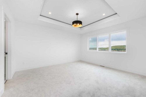 503 Rivercrest View, Cochrane, AB - Indoor Photo Showing Other Room