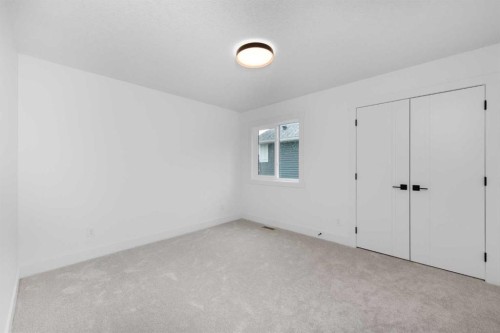 503 Rivercrest View, Cochrane, AB - Indoor Photo Showing Other Room