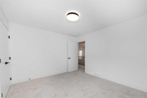 503 Rivercrest View, Cochrane, AB - Indoor Photo Showing Other Room
