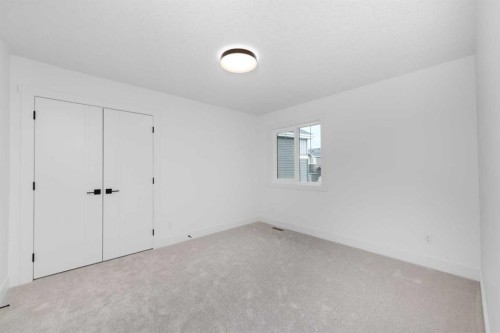503 Rivercrest View, Cochrane, AB - Indoor Photo Showing Other Room