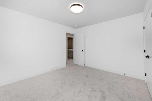 503 Rivercrest View, Cochrane, AB - Indoor Photo Showing Other Room