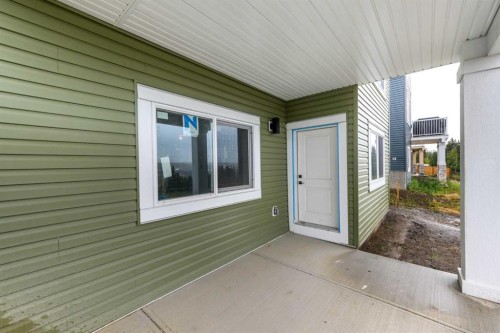 503 Rivercrest View, Cochrane, AB - Outdoor With Exterior