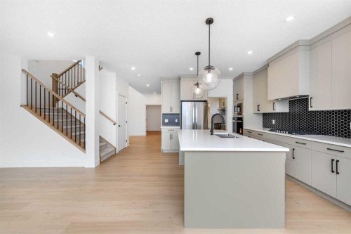 503 Rivercrest View, Cochrane, AB - Indoor Photo Showing Kitchen With Upgraded Kitchen
