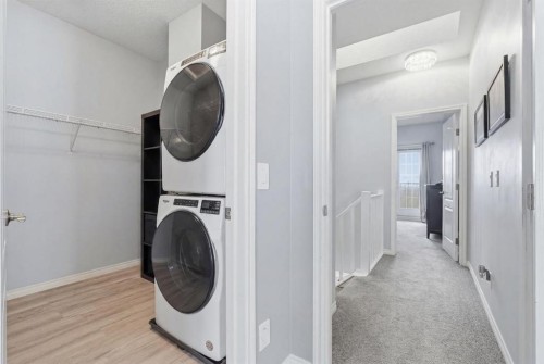 101 Sierra Morena Landing Sw, Calgary, AB - Indoor Photo Showing Laundry Room