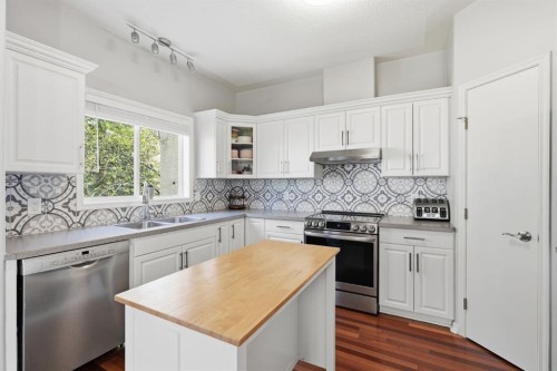 101 Sierra Morena Landing Sw, Calgary, AB - Indoor Photo Showing Kitchen With Stainless Steel Kitchen With Double Sink