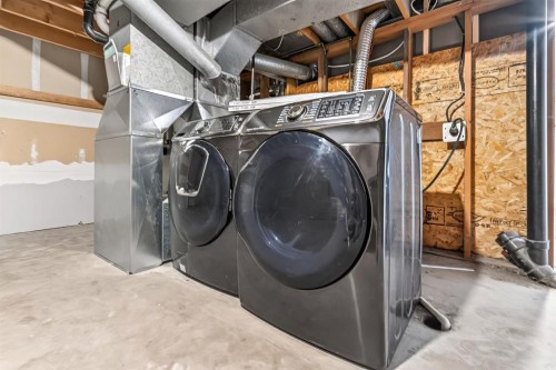 905-5340 17 Avenue Sw, Calgary, AB - Indoor Photo Showing Laundry Room