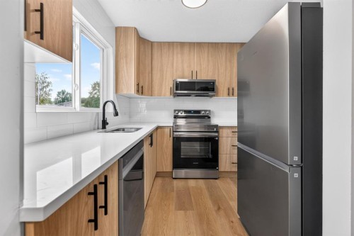 905-5340 17 Avenue Sw, Calgary, AB - Indoor Photo Showing Kitchen