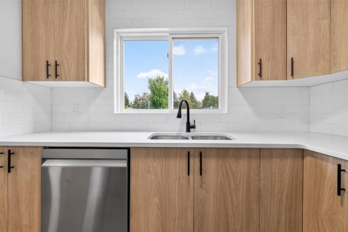 905-5340 17 Avenue Sw, Calgary, AB - Indoor Photo Showing Kitchen With Double Sink