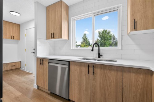905-5340 17 Avenue Sw, Calgary, AB - Indoor Photo Showing Kitchen With Double Sink