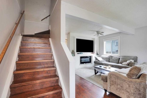 6515 Martingrove Drive Ne, Calgary, AB - Indoor With Fireplace