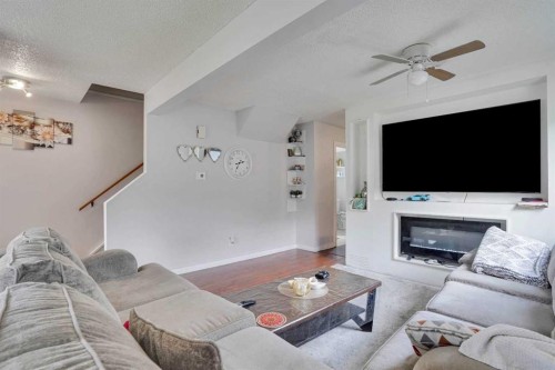6515 Martingrove Drive Ne, Calgary, AB - Indoor Photo Showing Living Room With Fireplace