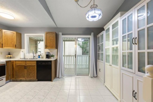 176 Riverbend Drive Se, Calgary, AB - Indoor Photo Showing Kitchen With Double Sink