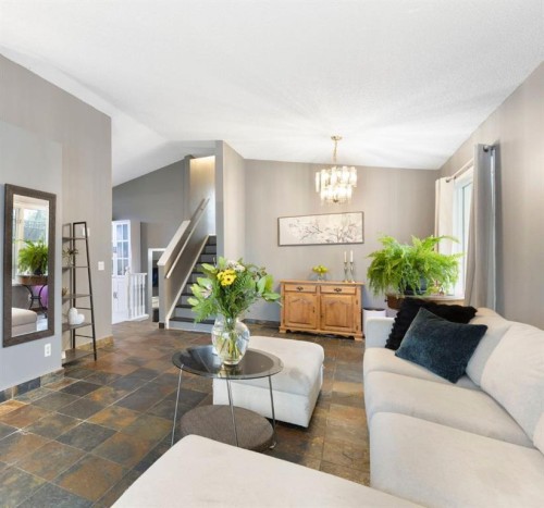 176 Riverbend Drive Se, Calgary, AB - Indoor Photo Showing Living Room