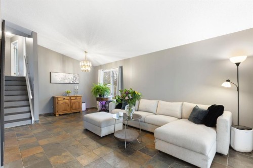 176 Riverbend Drive Se, Calgary, AB - Indoor Photo Showing Living Room