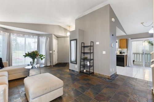 176 Riverbend Drive Se, Calgary, AB - Indoor Photo Showing Living Room