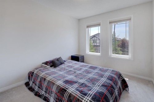 673 Hillcrest Road Sw, Airdrie, AB - Indoor Photo Showing Bedroom